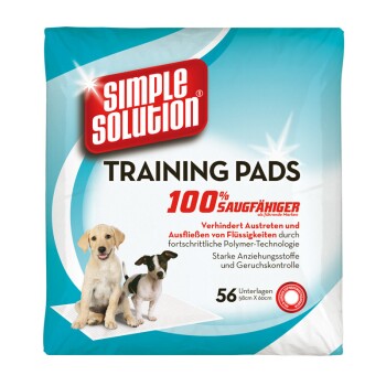 Paket mit Simple Solution Training Pads, das zwei Hunde zeigt, mit dem Text "100% Saugfähiger" und Details zur Flüssigkeitsabsorptions-Technologie.