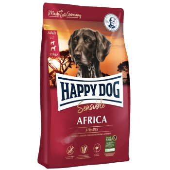 Hundefutterbeutel, beschriftet mit "Happy Dog Sensible Africa", mit einem Bild eines Hundes und Details zu den Zutaten, einschließlich Strauß.