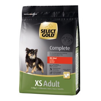 Select Gold Complete Hundefutterverpackung mit einem kleinen schwarz-braunen Hund. Text hebt "Mit Rind" und "XS Adult" für Hunde unter 4 kg hervor.